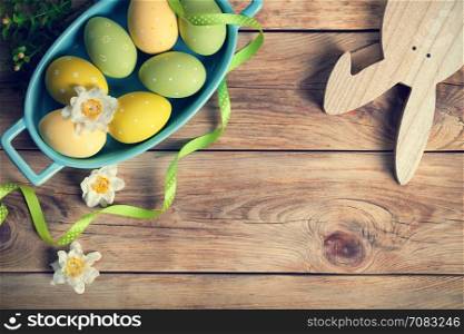 Easter background with Easter eggs. Top view. Copy space