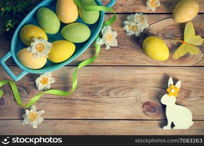 Easter background with Easter eggs. Top view. Copy space.