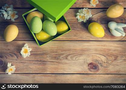 Easter background with Easter eggs. Top view. Copy space.
