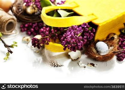 Easter background with eggs, nest and flowers