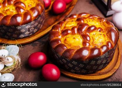 easter bread and eggs on wood