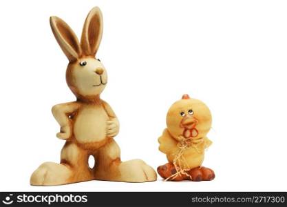 easter bunny and chicken figurines. easter bunny and chicken figurines on white background