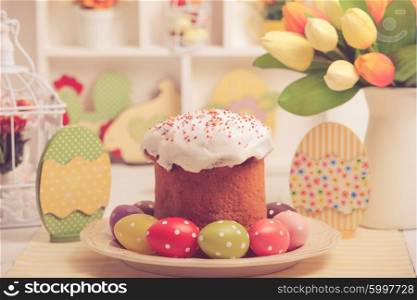 Easter cake with eggs on the table. Easter decorations. Easter decor and cake