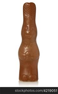 easter chocolate bunny with reflection on white background