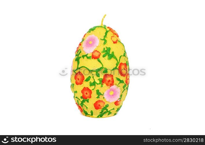 Easter colorful candle egg isolated on white background.