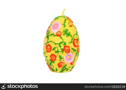 Easter colorful candle egg isolated on white background.