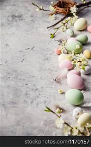 Easter composition on grey concrete backgrount, copy space