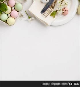 Easter composition on white backgrount, flat lay, top view, copy space. Easter composition on white backgrount, top view