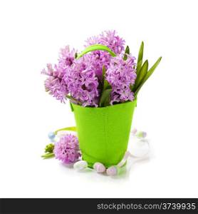 Easter composition with Beautiful Hyacinths in vase over white
