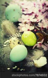 Easter composition with painted eggs and Cherry Blossom branches