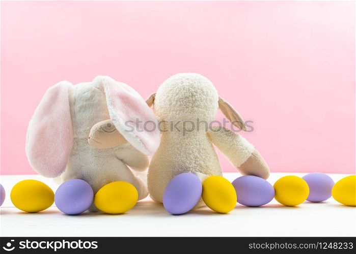 Easter day little Bunny rabbit hug rabbit friend With Decorated Eggs