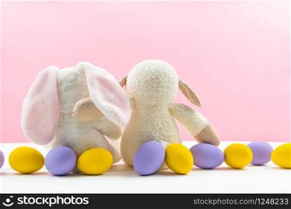 Easter day little Bunny rabbit hug rabbit friend With Decorated Eggs