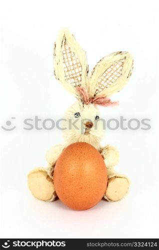 Easter decoration with egg and rabbit, isolated on white
