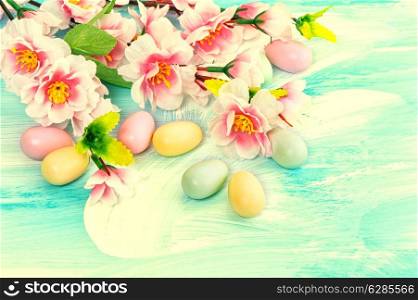 Easter decoration with flowers and eggs. Springtime. Retro style toned picture