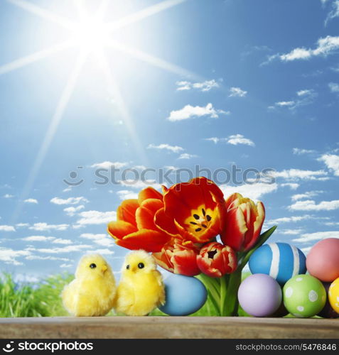 Easter decoration with tulips and colored eggs