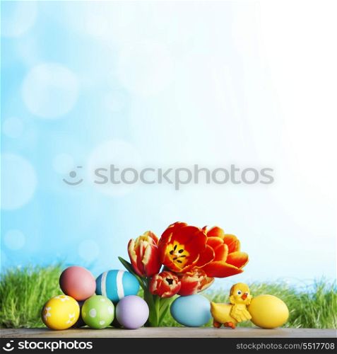 Easter decoration with tulips and colored eggs