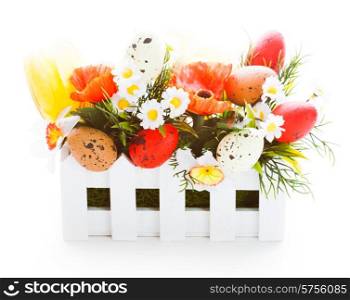 Easter decorations: flowers and eggs isolated on white. Easter decorations