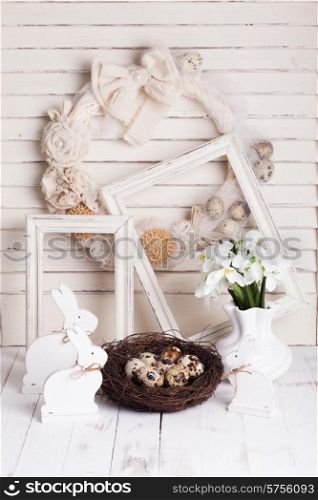 Easter decorations - shabby chic white rabbits and wreath. Easter decorations