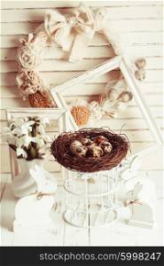 Easter decorations - shabby chic white rabbits and wreath. The Easter decorations