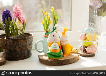 Easter decorations - textile rabbit with egg and flowers. Easter textile basket