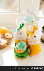 Easter decorations - textile rabbit with egg and flowers. Easter textile basket