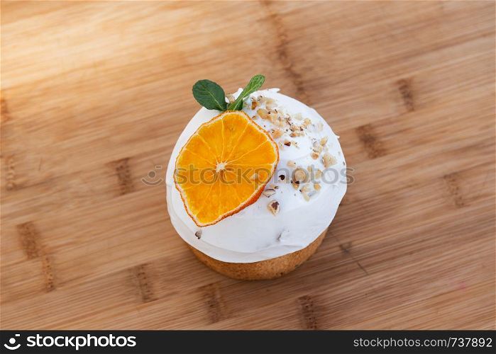 Easter, Easter cake with a complex composition, beautiful scenery, dried fruits.. Easter, Easter cake on wooden background with a complex composition, beautiful scenery, dried fruits