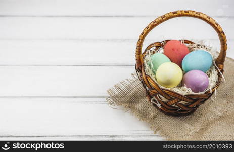 easter eggs basket wooden table