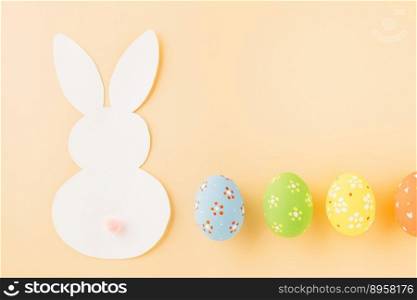 Easter eggs bunny and rabbit white paper cutting isolated on pastel background. Funny decoration, Happy Easter Day, Festive composition banner design holiday background