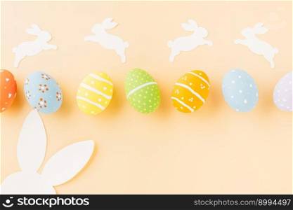 Easter eggs bunny and rabbit white paper cutting isolated on pastel background. Funny decoration, Happy Easter Day, Festive composition banner design holiday background
