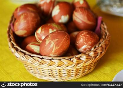 Easter eggs dyed onion skins in basket