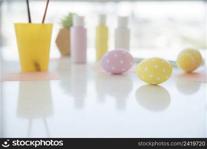 easter eggs near sheets colors table