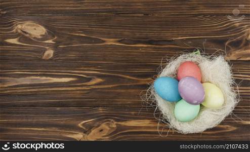 easter eggs nest wooden table
