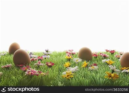 Easter eggs on artificial meadow