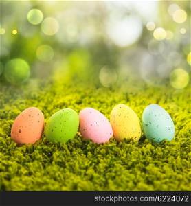 Easter eggs on the grass, holiday decorations