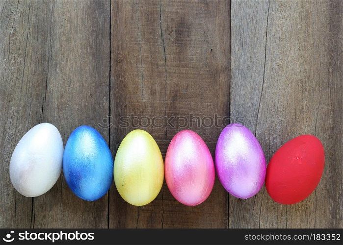 Easter eggs on wood background,Handmade painted for design happy Easter day.