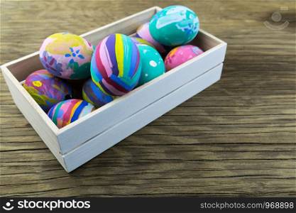 Easter eggs on wooden background. Selective focus.