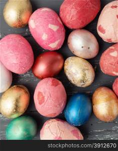 Easter eggs on wooden table. Holiday background