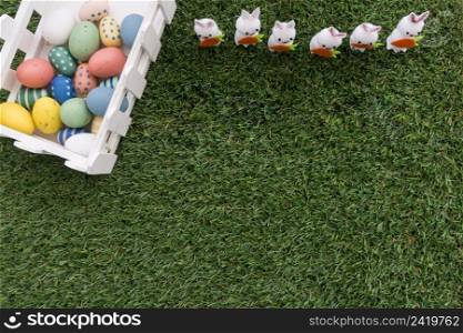 easter eggs rabbits grass surface