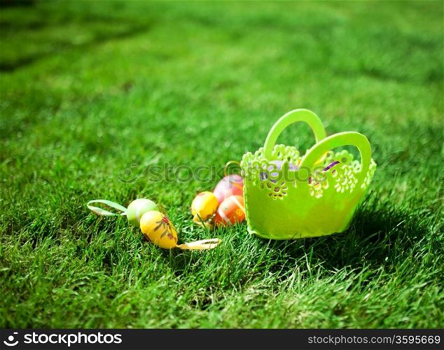 Easter Eggs with Basket on the Grass