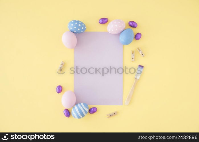 easter eggs with blank purple paper table