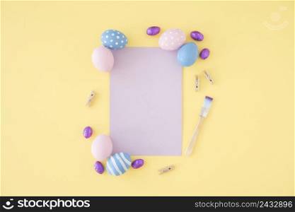 easter eggs with blank purple paper table