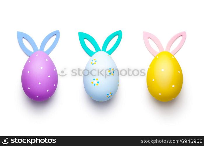 Easter eggs with bunny ears isolated on white background. Top view