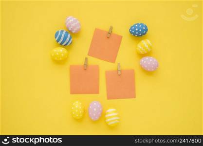easter eggs with small blank papers table