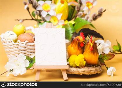 Easter greetings with eggs, flowers and chicken