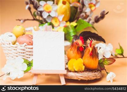 Easter greetings with eggs, flowers and chiken