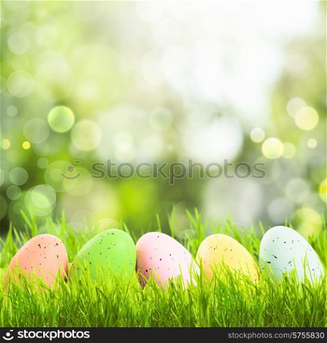 Easter greetings with grass and eggs with copy space. Easter greetings