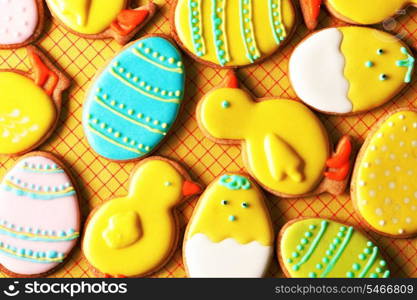 Easter homemade gingerbread cookie over tablecloth