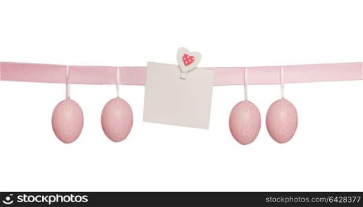 Easter pink hanged eggs with greeting card mock up , isolated on white background