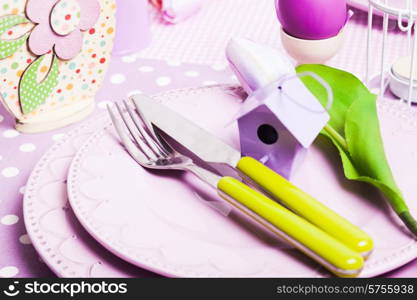 Easter serving, lilac plates and green flatware and decor