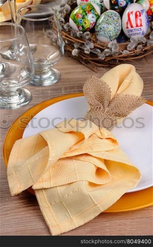 Easter table decoratively folded napkins in the form of a hare